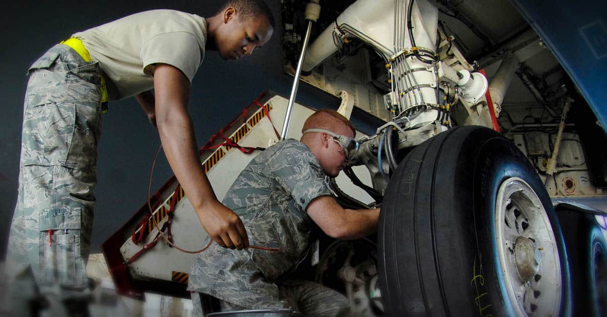 B-2_ Aircraft Maintenance Squadron safety wires a brake bleed on a B-2 Spirit