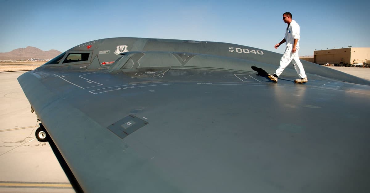 B-2_Tech. Sgt. Kevin Ponton examines the wing surface of a B-2