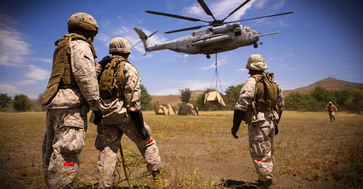 CH-53E-Marines with Helicopter Support Team watch pound target lifted by a CH-53E