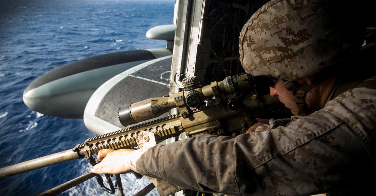 H-53E_ Marine Cpl. Jakob Stark practices aerial sniping from a CH-53E Super Stallion