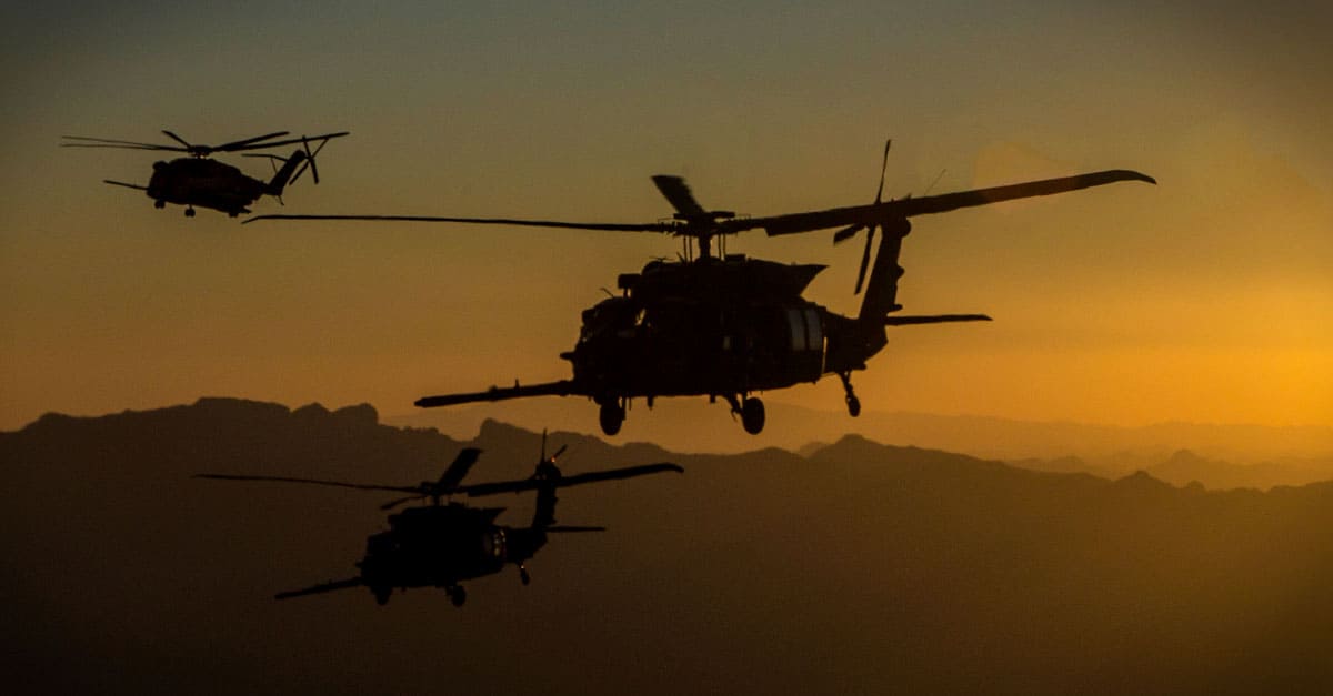 CH-53E_ a CH-53E and two MH-60M Blackhawks conduct an aerial refueling exercise