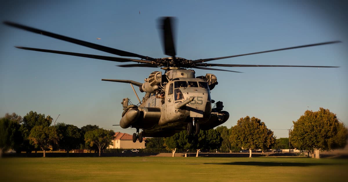 CH-53E_A CH-53E helicopter lands to offload personnel