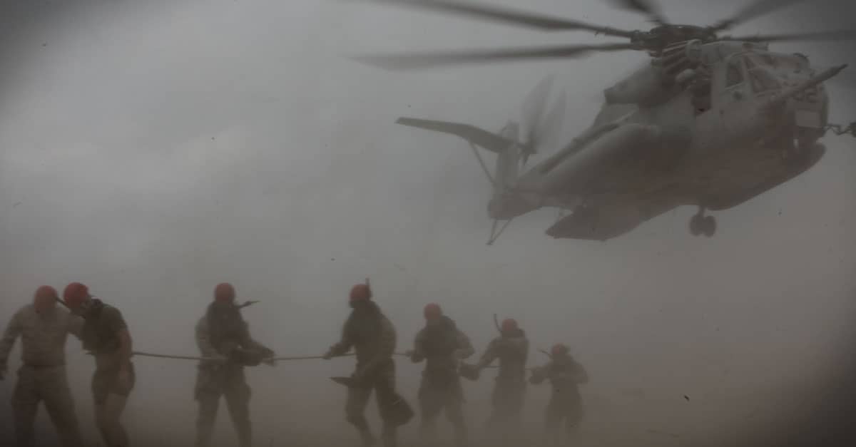 CH-53E_Marines and sailors are lowered to the ground during their cast master course
